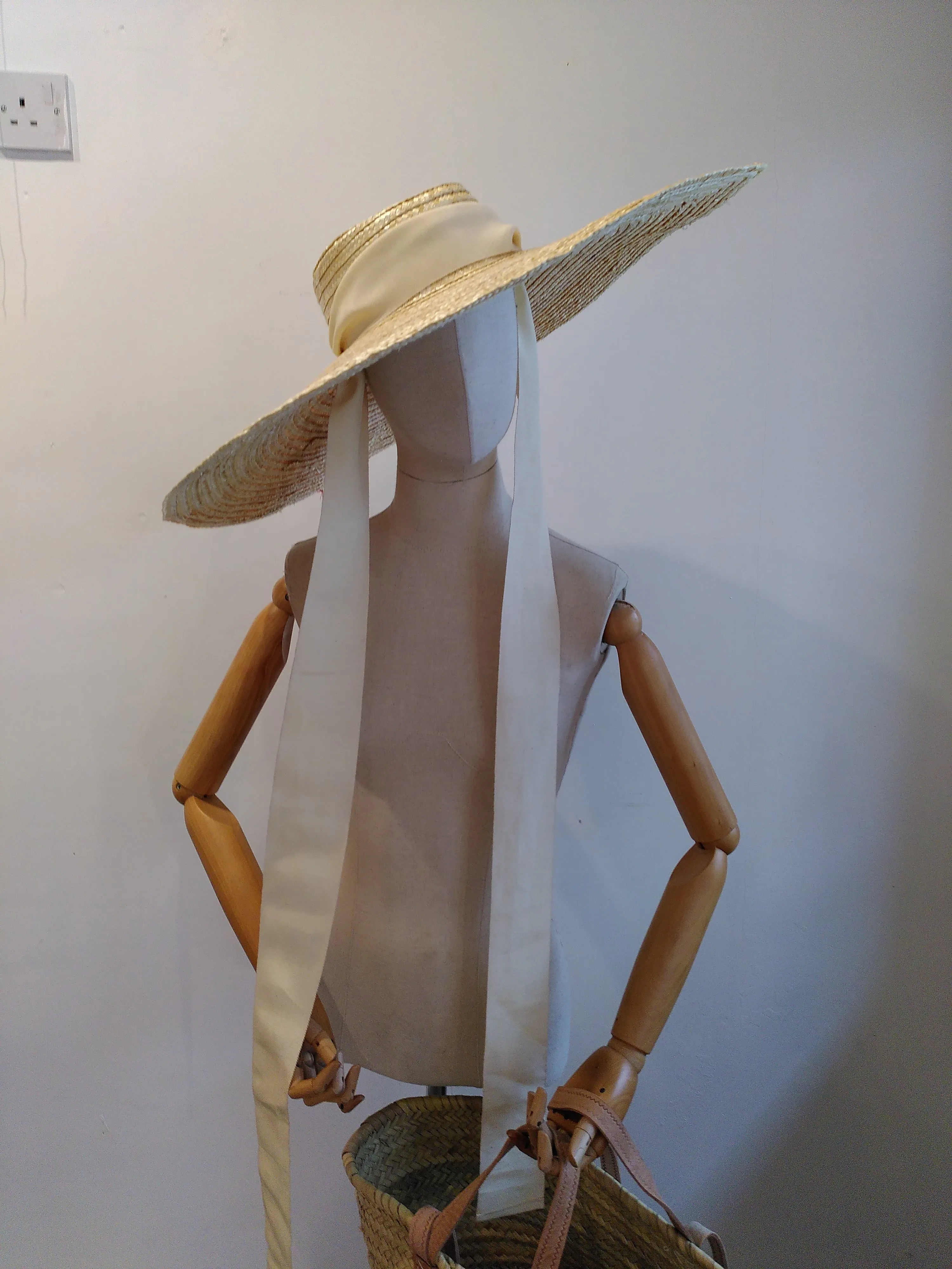 Large brimmed straw hat